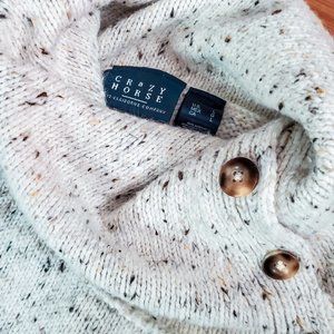 Button turtleneck sweater